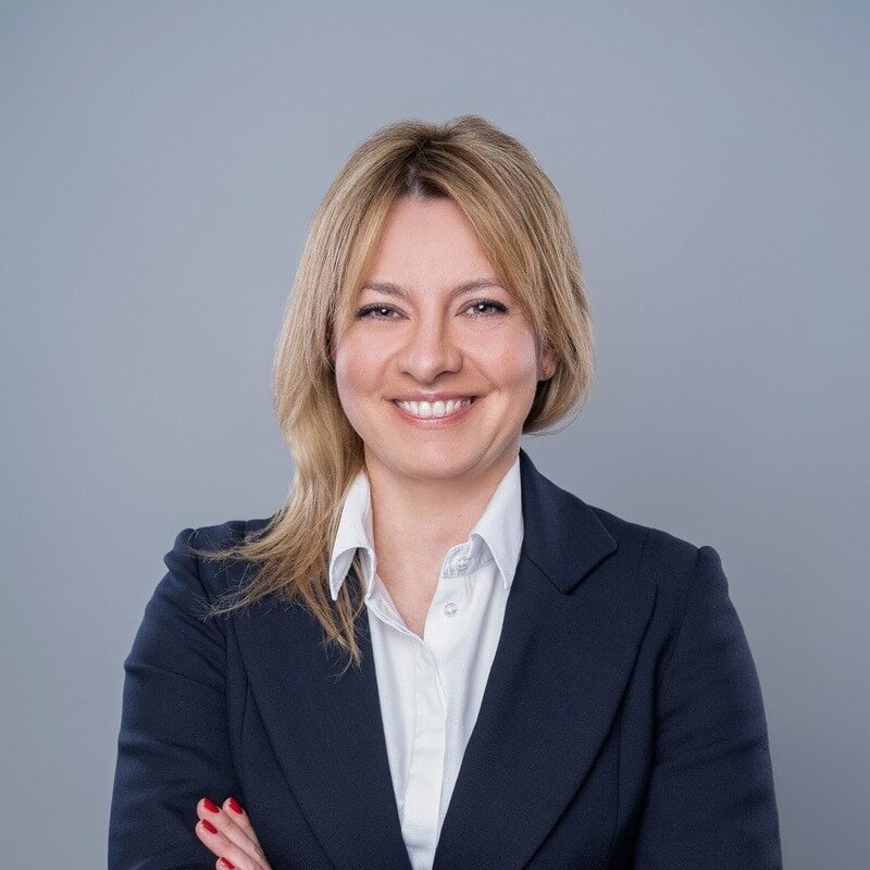 A portrait photo of a smiling Anna Wisniewska, Managing Director Poland