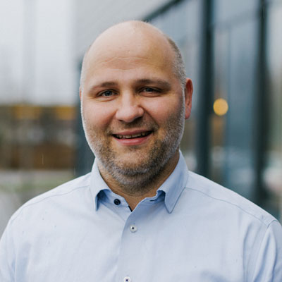 A portrait photo of a smiling Mats Bjerkaas, Managing Director Element Logic Norway