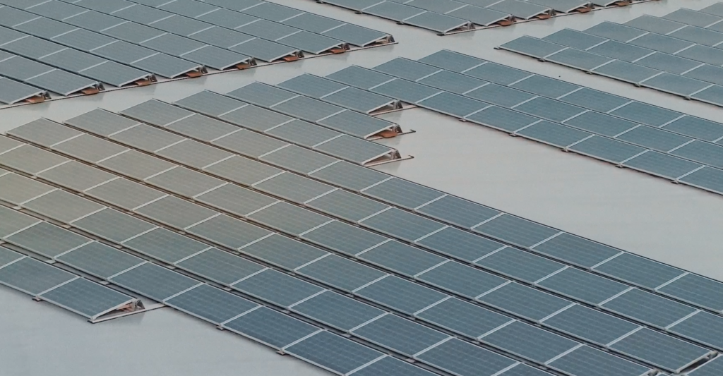 A drone photo of the solar cell panels on the roof of the Apotea site.