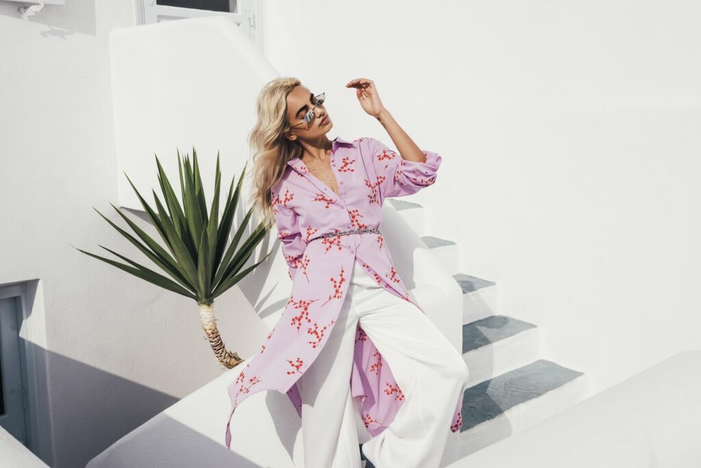 A woman in a flower dress posing