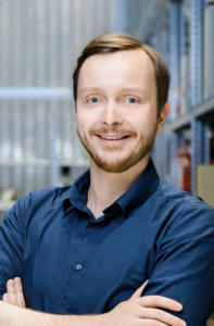 Portrait of a man in blue tshirt