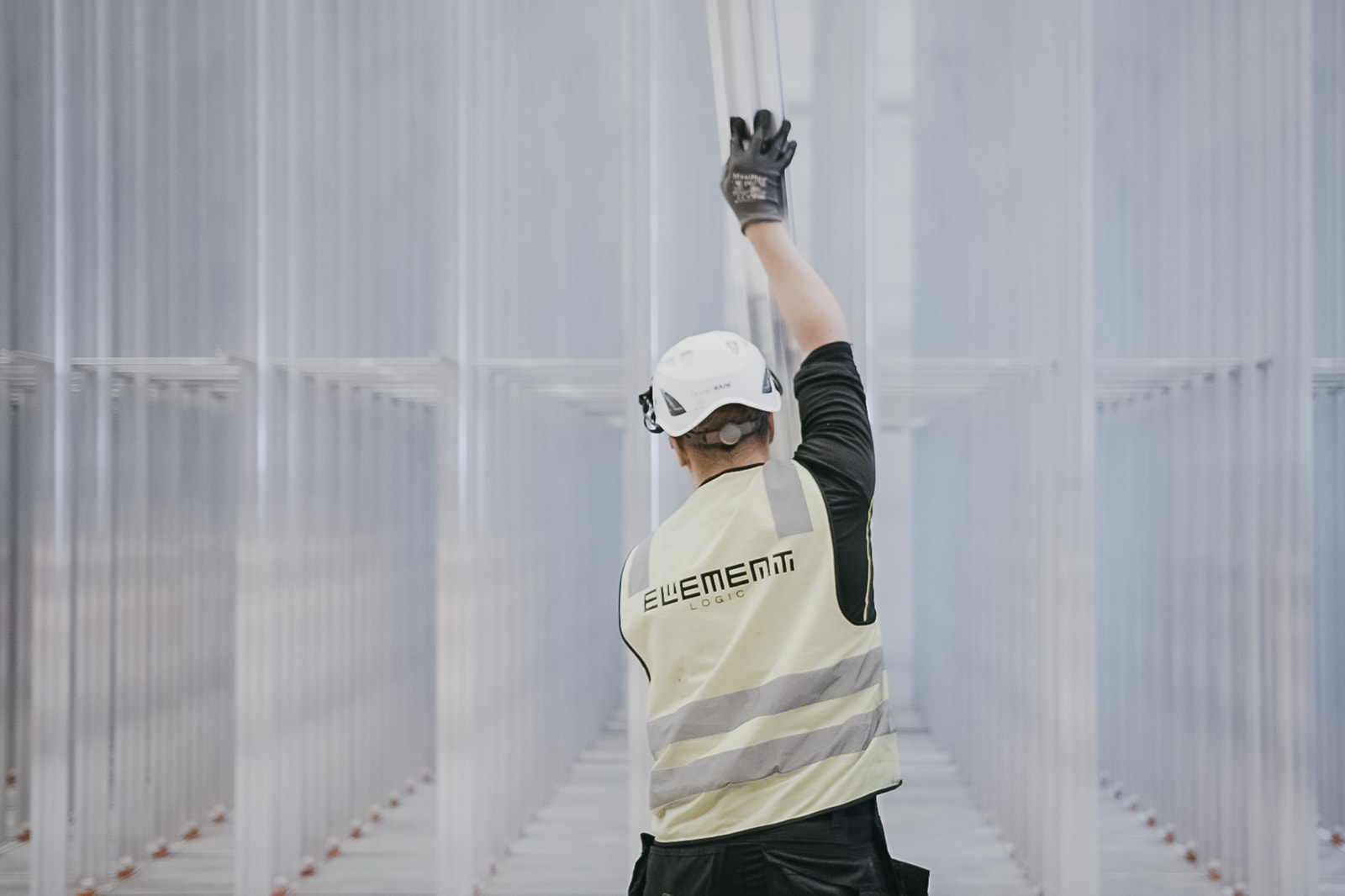 Man working on setting up a warehouse grid