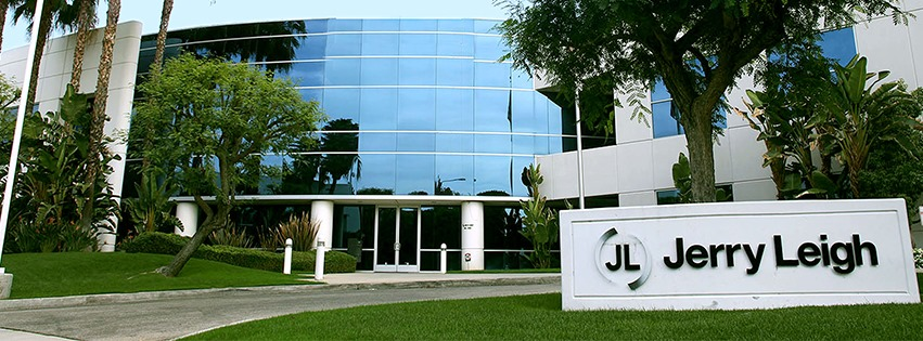 Outside glass building with sign Jerry Leigh