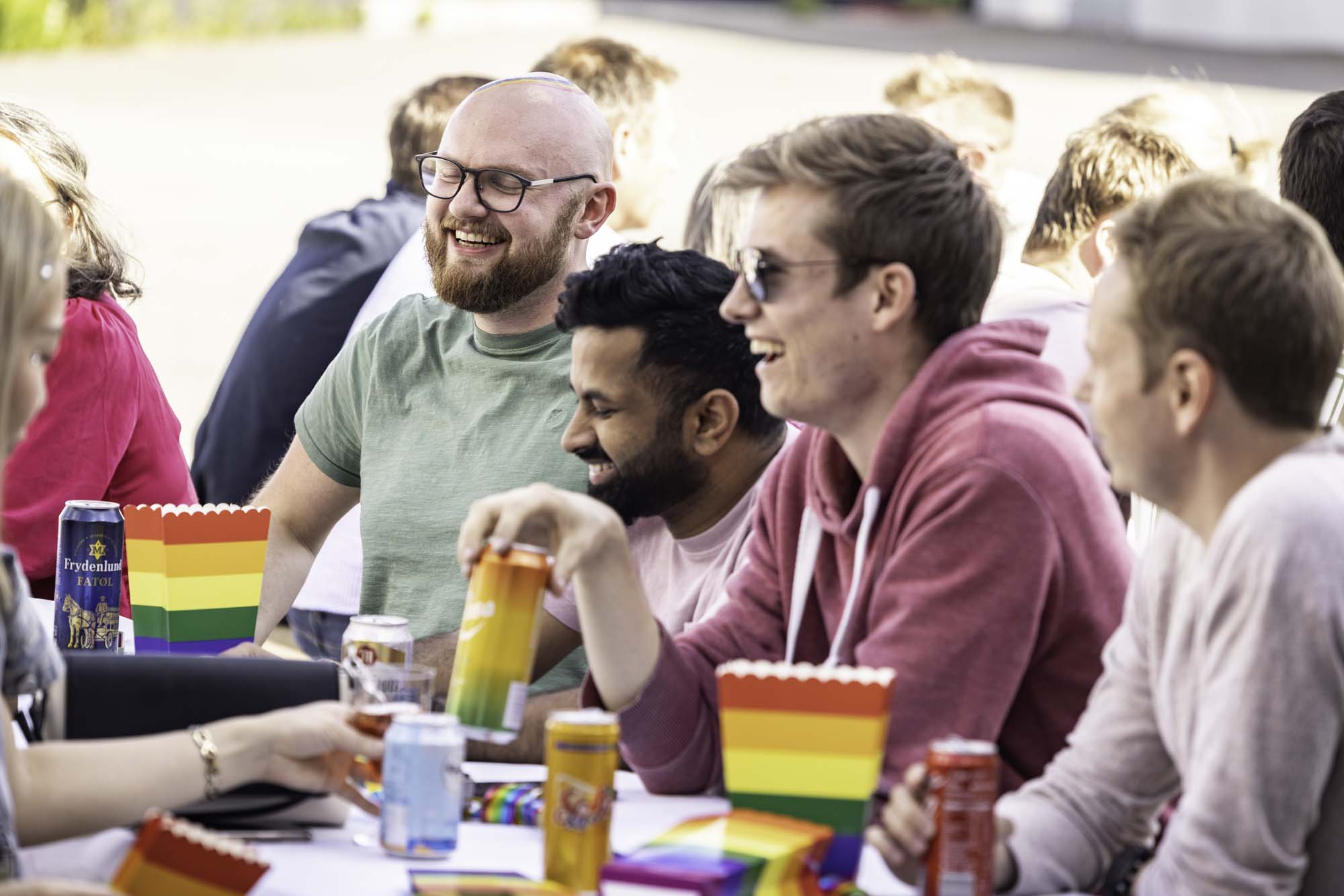 A group of people celebrating and laughing together