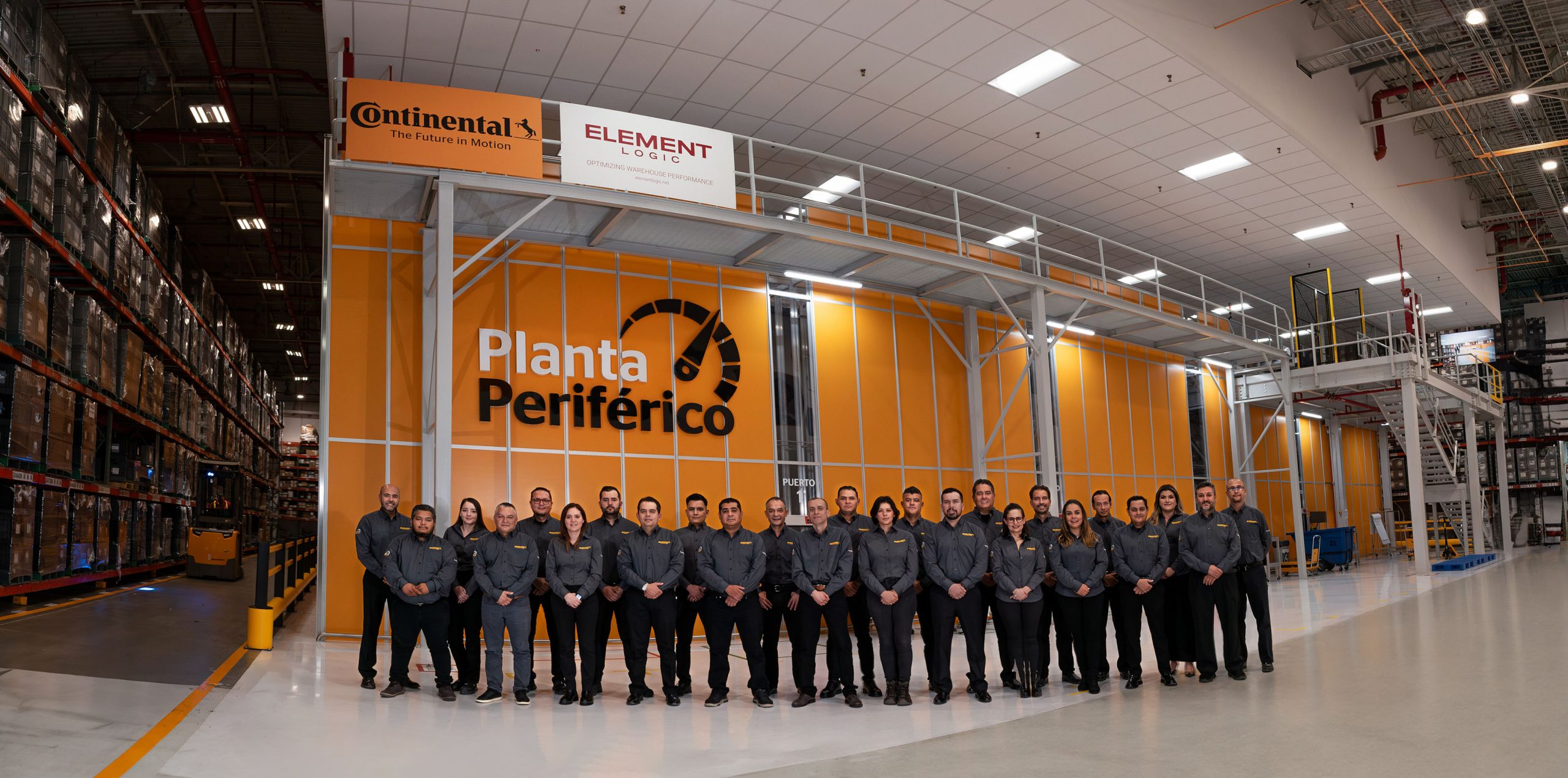Picture of the Continental AutoStore from Element Logic with employees standing in front.